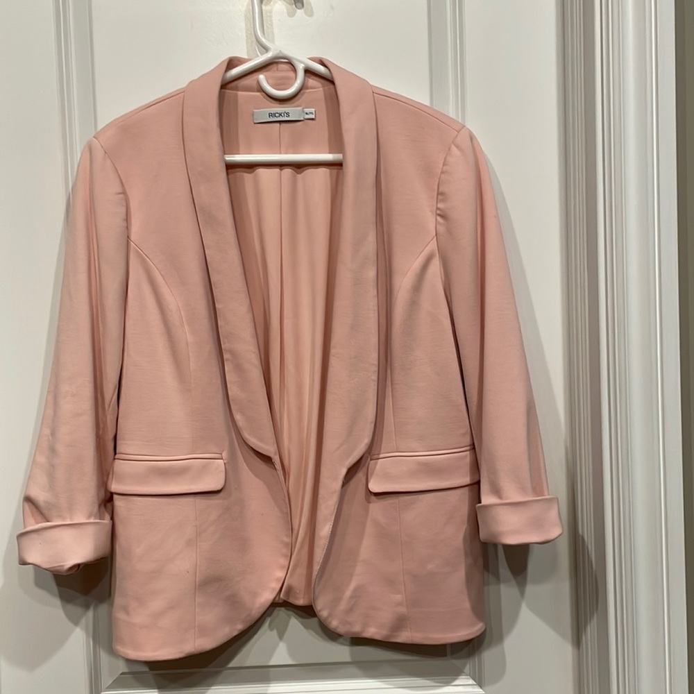 Pink blazer.